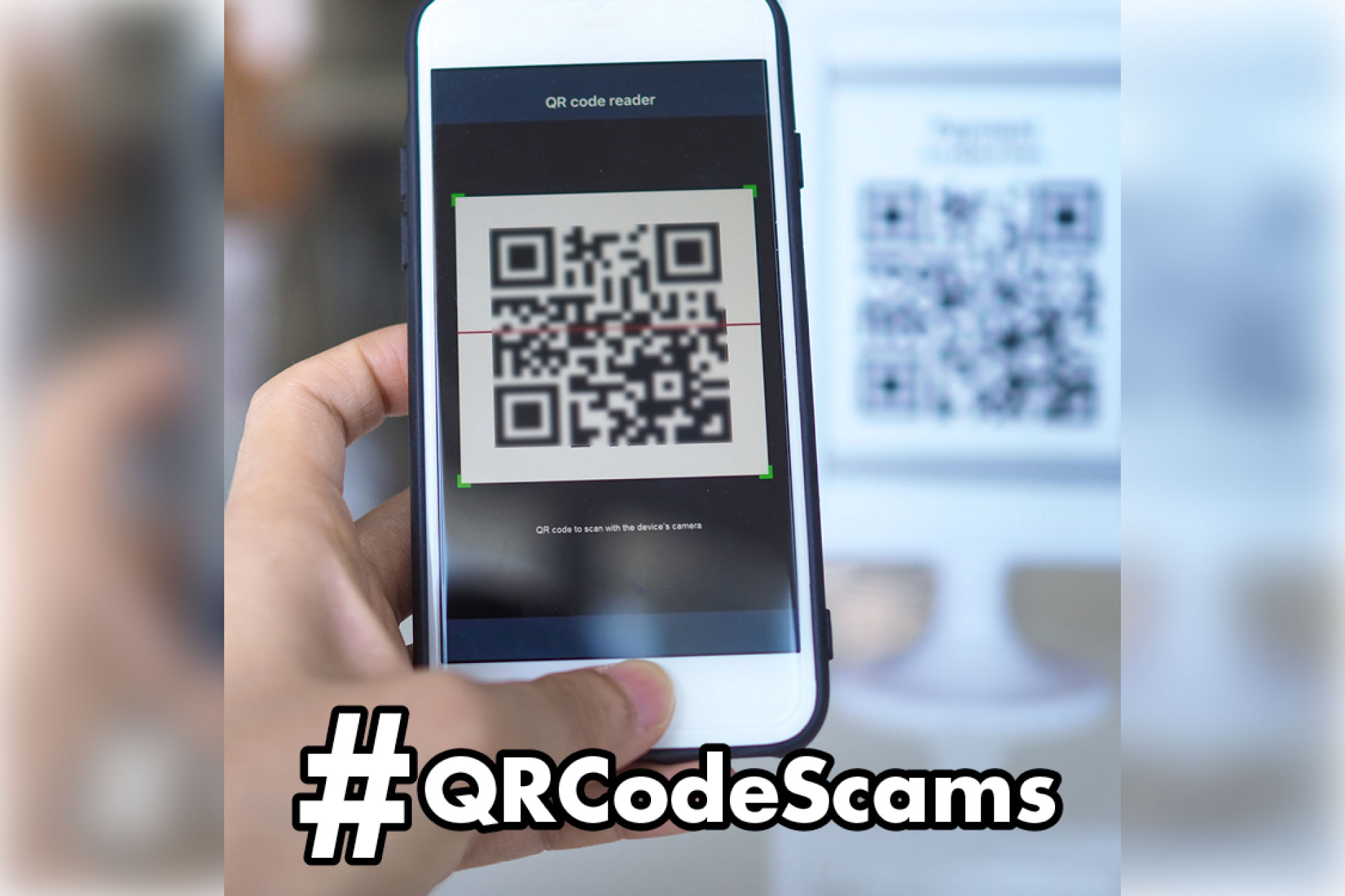 QR Scams Blog - person scanning a QR code on their cell phone.