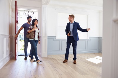 couple house hunting with real estate agent